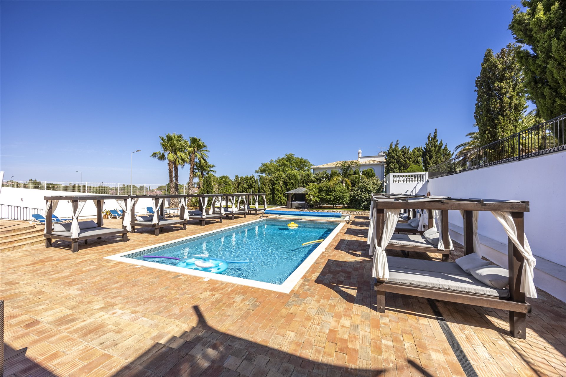 Day beds beside the pool