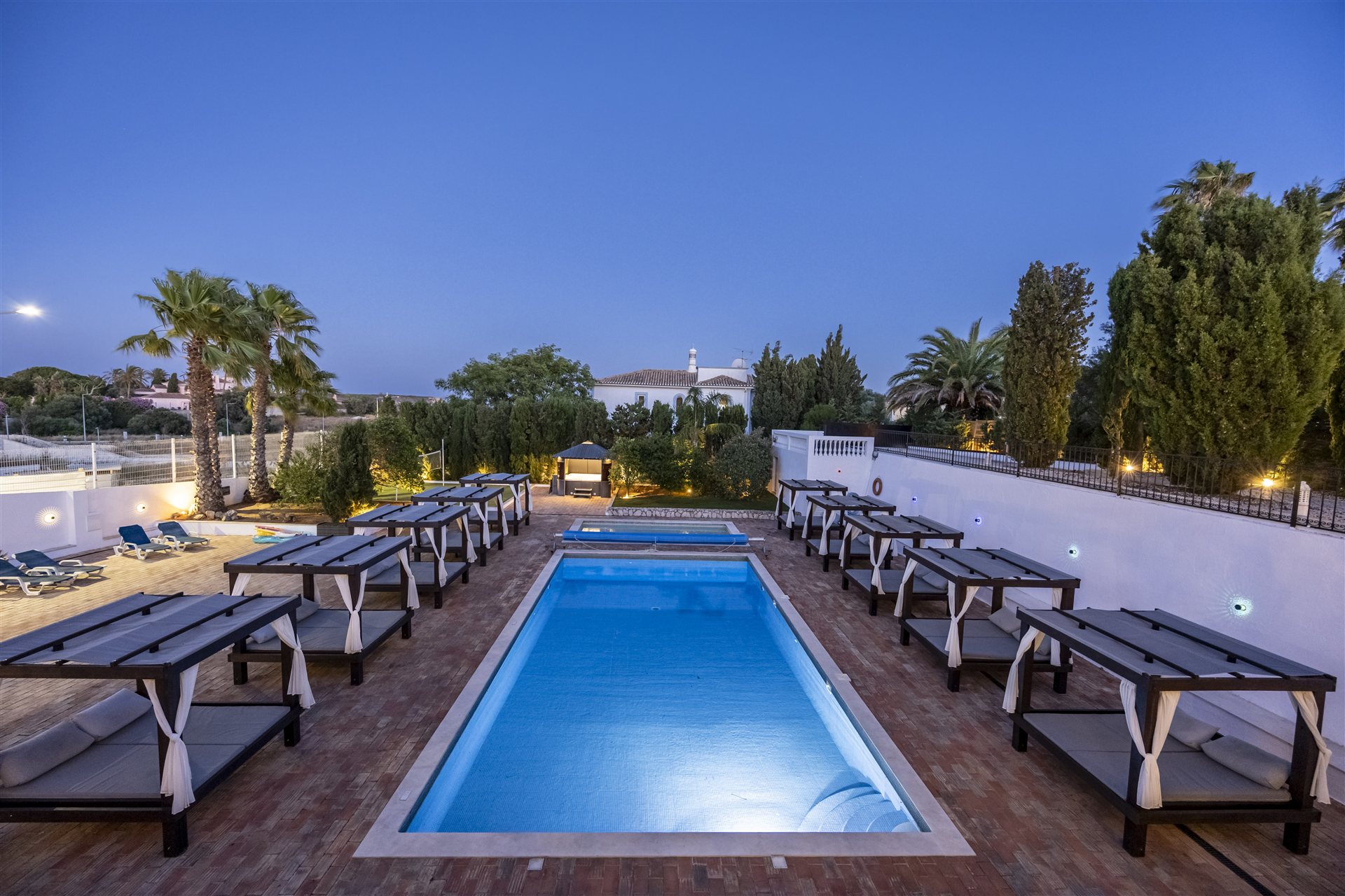 The pool with sun loungers