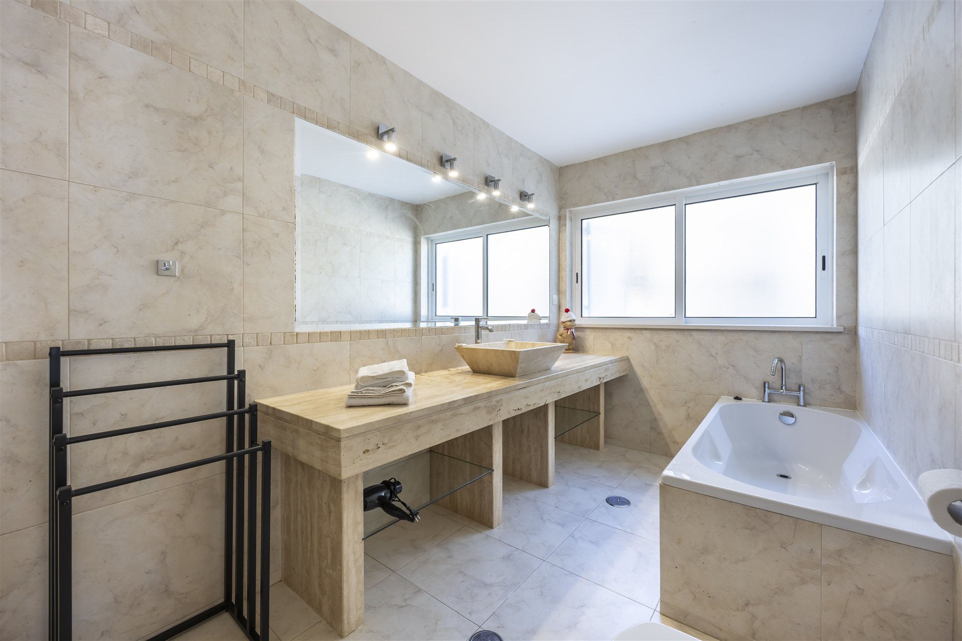 En-suite bathroom with double basins